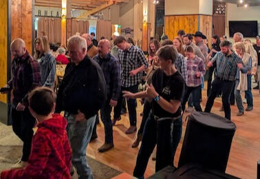 Guests of all ages learn a line dance during a Two Right Feet lesson at Thunderhead Lodge. Guests of all ages learn a line dance during a Two Right Feet lesson at Thunderhead Lodge.