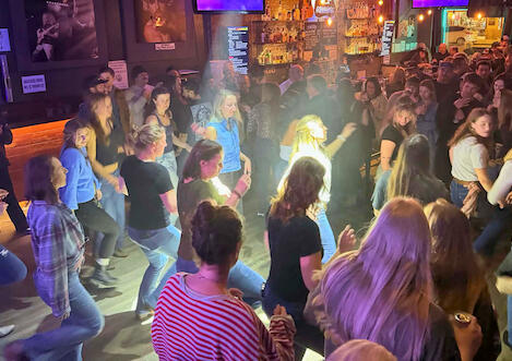 Jenny, Kelly, and friends line dance at Two Step Tuesday at Schmiggity's. Jenny, Kelly, and friends line dance at Two Step Tuesday at Schmiggity's.