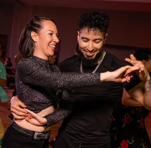 Jenny dances salsa at Denver's CALDEC festival. Jenny and Alex from Bailo la Pena perform in Steamboat Dance Theater